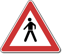 prometni znak-covjek na cesti